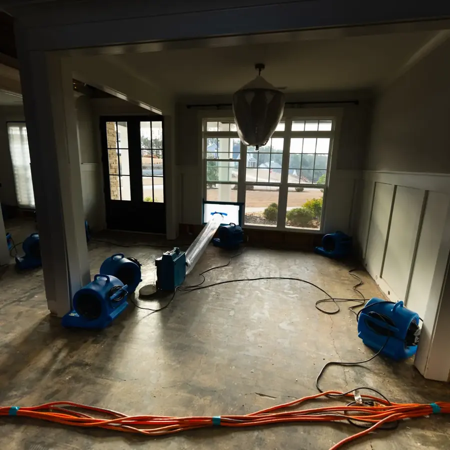 Air movers finishing a structural dry-out in an Arlington, VA home